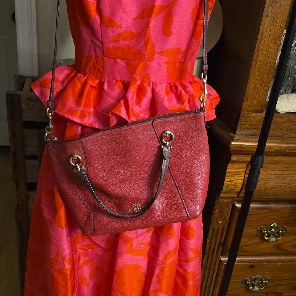 Chic Red Leather Shoulder Bag by Coach